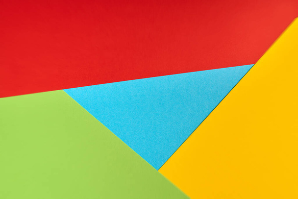 Popular browser logo from paper. Red, yellow, green and blue colors. Colorful and bright logo - Photo, Image