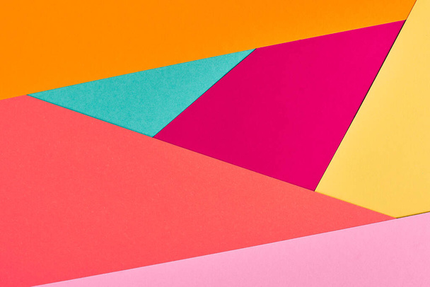 Multicolored paper background. Abstract colorful paper texture, copy space. Bright colors for design geometric backdrop. Color blank for presentations. - 写真・画像