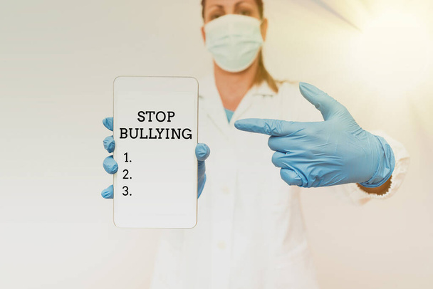 Signo de texto que muestra Stop Bullying. Enfoque empresarial expresando su campaña contra la violencia hacia las víctimas Demostración de la tecnología médica Presentando un nuevo descubrimiento científico - Foto, Imagen