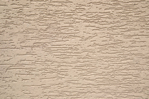 Texture stucco, brun gris ou beige, gros plan, surface texturée sombre et sale - Photo, image