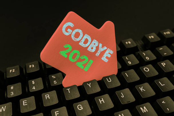 Text showing inspiration Godbye 2021. Business concept express good wishes when parting or at the end of last year Converting Written Notes To Digital Data, Typing Important Coding Files - Photo, Image