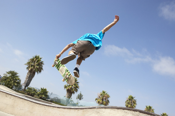 Teenage Boy In Skateboard Park - 写真・画像
