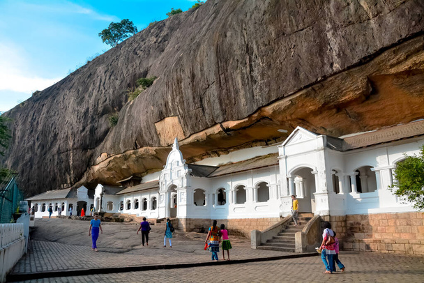 Dambulla cave temple is a World Heritage Site in Sri Lanka, situated in the central part of the country. This site is situated 148 kilometres east of Colombo , 72 kilometres north of Kandy and 43 km north of Matale - Photo, Image