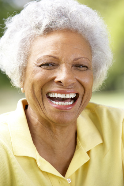 Portrait Of Smiling Senior Woman Outdoors - Foto, imagen