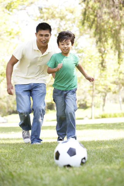 Father And Son In Park With Football - Foto, Bild