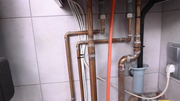 Professional HVAC Worker Repairing Gas Heater. Hot Water Boiler Systems Check. - Filmagem, Vídeo
