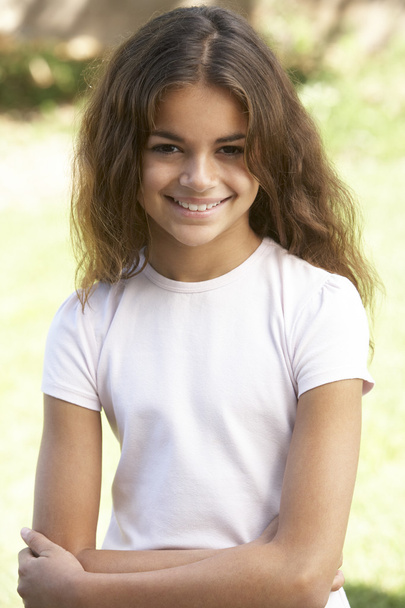 Portrait Of Young Girl In Park - 写真・画像