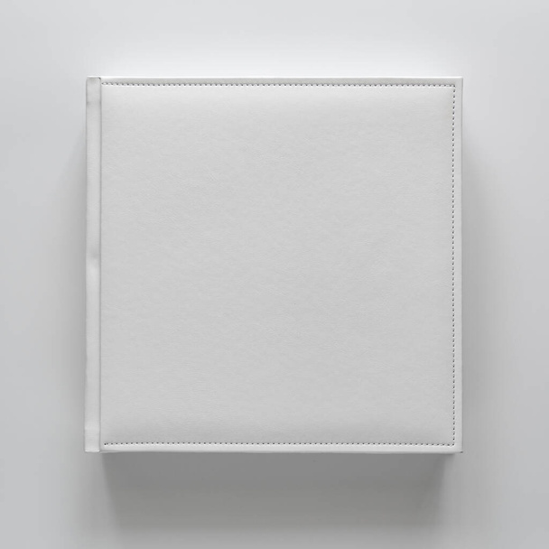white book in leather binding. printing products. photobooks and albums. individual products. - Photo, Image