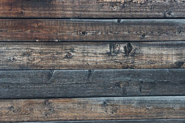 gray brown wooden background of a  boards in the wall of the fence - Zdjęcie, obraz