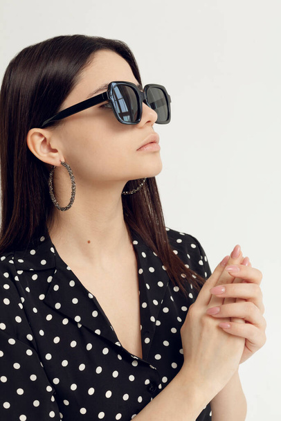 portrait of a beautiful girl in black sunglasses - Фото, изображение