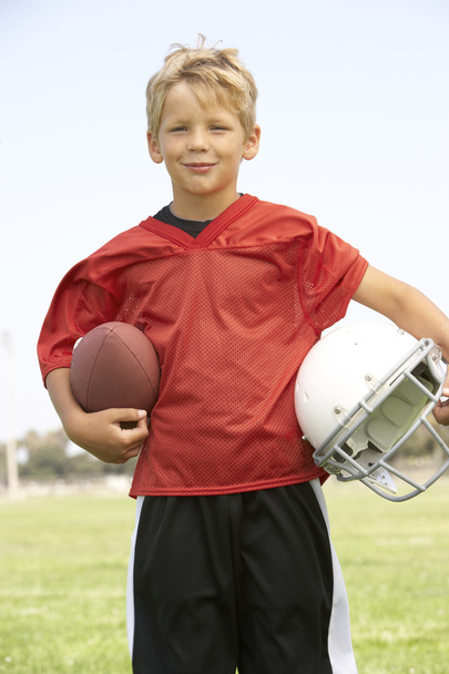 Young Boy Playing American Football - Foto, afbeelding