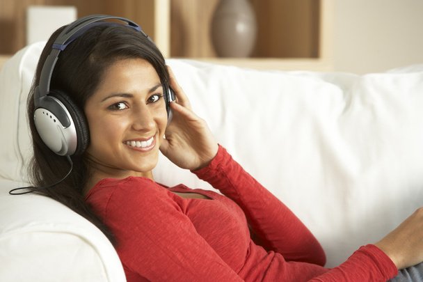 Young Woman Listening To Music At Home - Valokuva, kuva