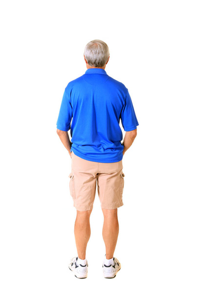 Human Male. Caucasian Man. A man facing away from the camera. Isolated on white. Room for text. Clipping Path. Man standing giving his back to the camera.  - 写真・画像