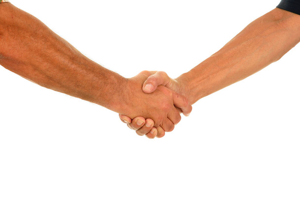 Hand Shake. Two men shake hands. Isolated on white. room for text. clipping path. Two businessman shaking hands. hand shake as a symbol for help.hand shake for closing a contract. handshake for friendship. hand shake greeting. hand shake trust. hands - Photo, Image