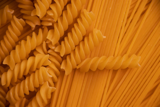 pasta seca, espaguetis, fondo alimentario - Foto, Imagen