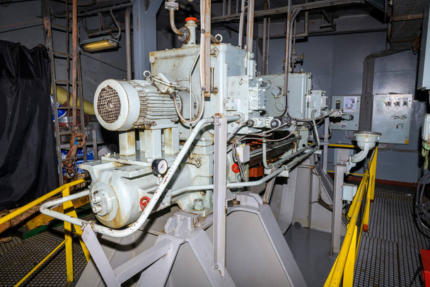 Steering gear. Rudder machine. Hydraulic pump. Marine engine. Steering room on big vessel. - Photo, Image