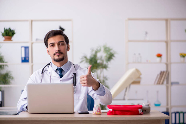 Young male doctor in telemedicine concept - Photo, Image