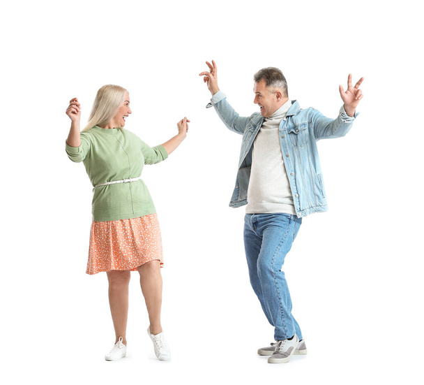 Dancing mature couple on white background - Foto, Imagen