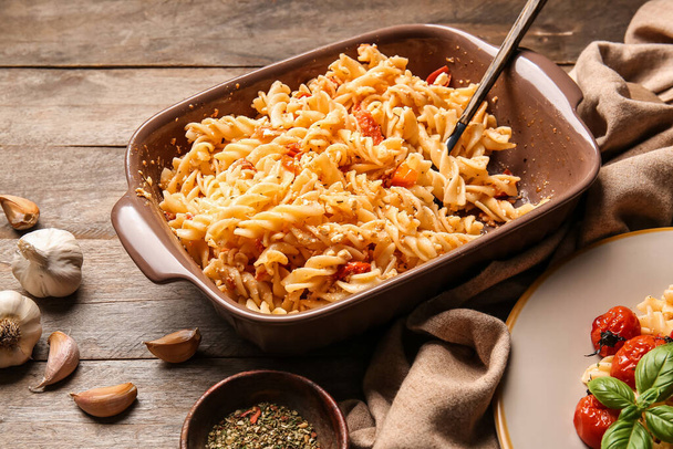 Baking dish with healthy pasta on table - Zdjęcie, obraz