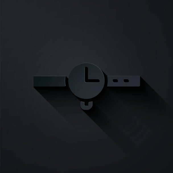 Paper cut Wrist watch icon isolated on black background. Wristwatch icon. Paper art style. Vector - Вектор,изображение