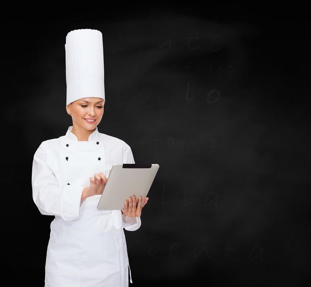 smiling female chef with tablet pc computer - Fotoğraf, Görsel