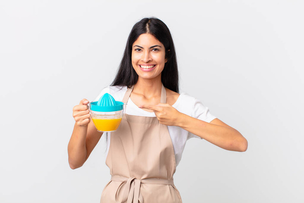 hispanic pretty chef woman. orange juice and breakfast concept - Zdjęcie, obraz