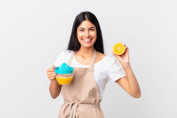 hispanic pretty chef woman. orange juice and breakfast concept - Zdjęcie, obraz