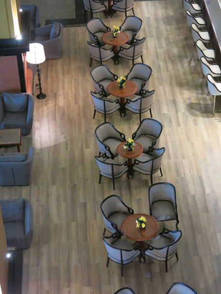 interior of modern business hall and cafe with tables and chairs, high angle view - Fotoğraf, Görsel