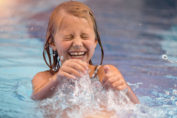 Happy Little Girl in the Pool - Photo, Image