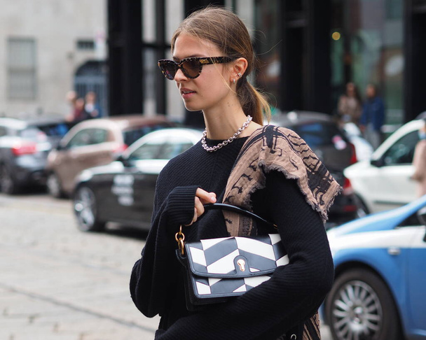 Fashion blogger street style outfit before Drome Fashion Show at Milan Fashion Week Fall/Winter 2020/2021 collections. - 写真・画像