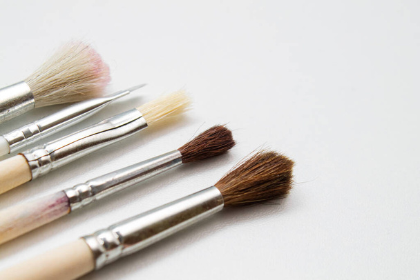 Brushes for makeup and manicure. Stylist. Beauty and fashion. Background for the designer. - Foto, immagini