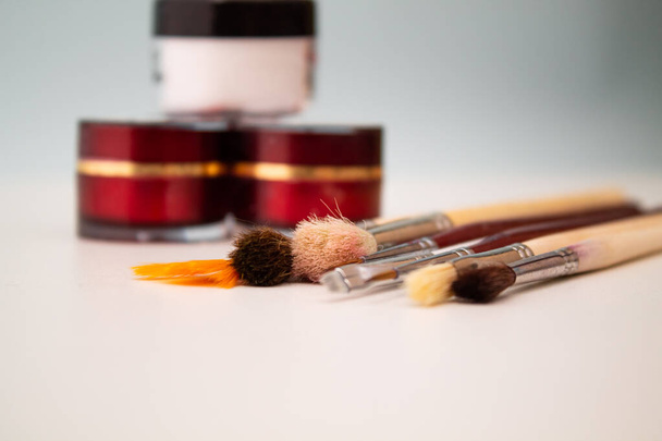 Brushes for makeup and manicure. Stylist. Beauty and fashion. Background for the designer. - Foto, immagini