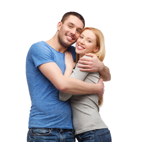 Abraço de casal sorridente
 - Foto, Imagem