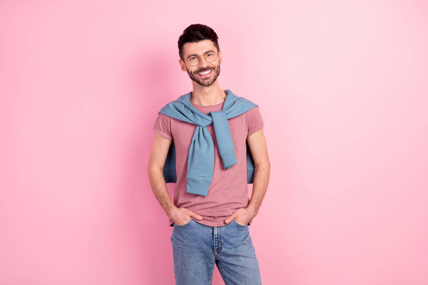 Photo of happy charming positive young man wear glasses casual clothes isolated on pastel pink color background - Fotografie, Obrázek