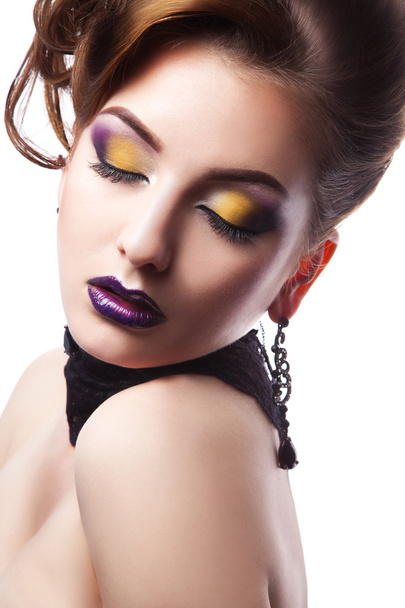Portrait of gorgeous woman with closed eyes and make up in studi - Foto, Bild