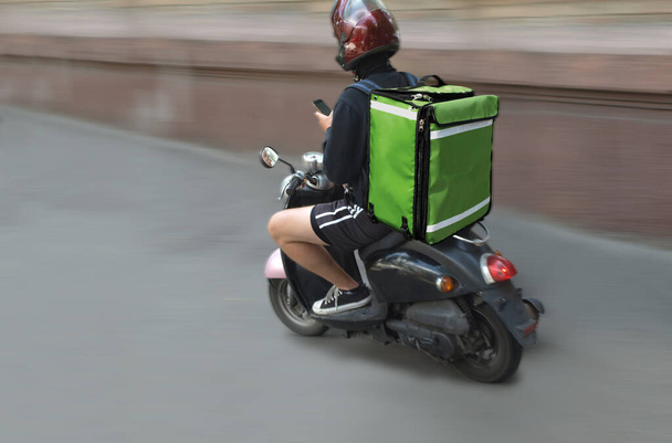 Blur, Couriers carry out orders for the delivery of goods - Foto, Imagem