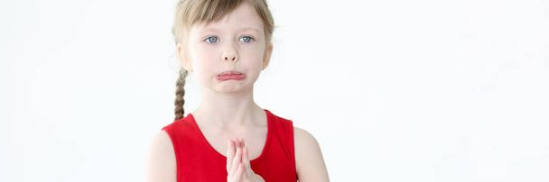 Portrait of little offended girl with blue eyes - Fotografie, Obrázek