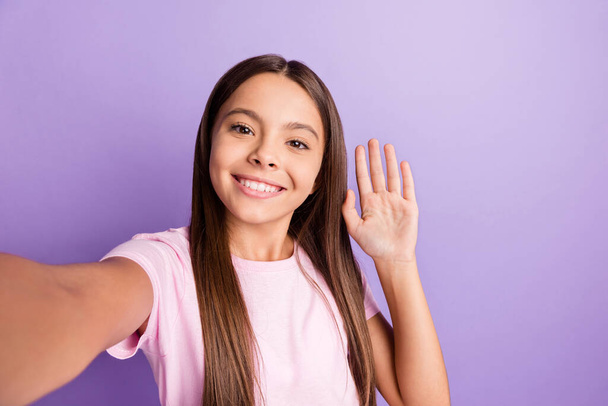 Photo of optimistic nice brunette girl do selfie wear t-shirt isolated on pastel purple color background - Фото, зображення