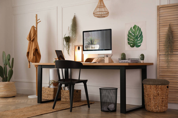 Modern workplace with computer in room. Interior design - Фото, изображение