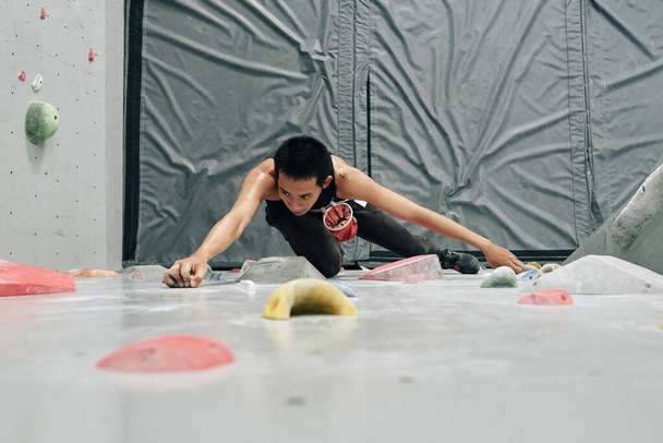 Strong Athletic Man Bouldering - Photo, Image