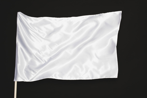 white satin flag isolated on black - Photo, image