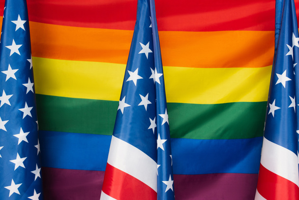american flags against lgbt colorful background - Foto, Imagem