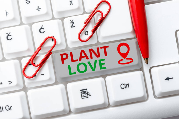 Podpis koncepcyjny "Roślinna miłość". Conceptual photo symbol miłości emocjonalnej, opieki i wsparcia pokazał innym Abstrakcyjny Programista wpisując kody antywirusowe, Przepisywanie kodów debugowania - Zdjęcie, obraz
