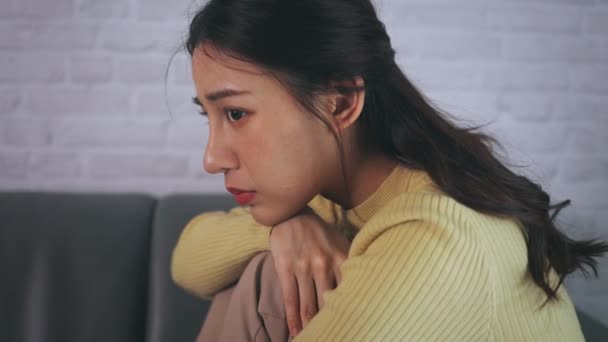 Sad and depressed woman at home - Кадри, відео