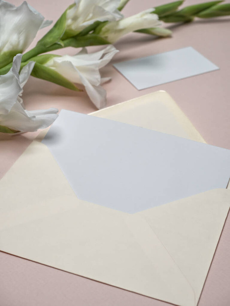 Blank party invitation card and table place card with gladiolus flower. - Photo, Image