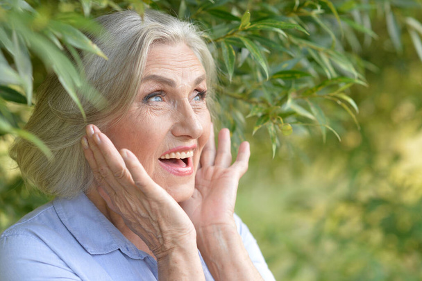 happy smiling senior woman outdoors  - Zdjęcie, obraz