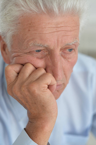 Portrait of a sad senior man thinking  - Fotó, kép