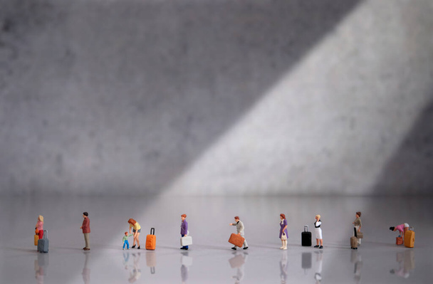 Miniature people in queue at airport terminal - Photo, Image