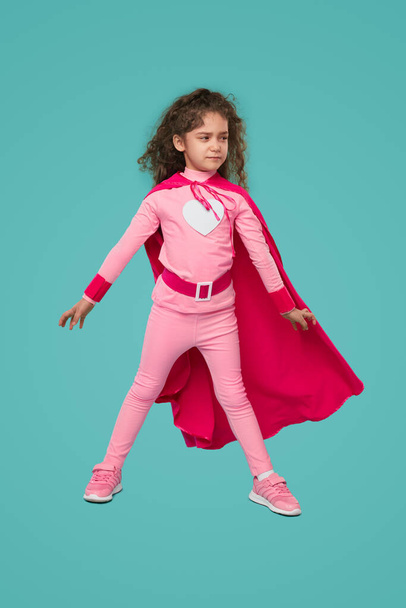 Serious little superhero ready to save world - Valokuva, kuva