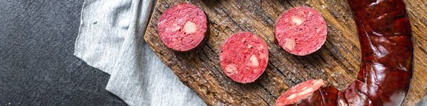 black pudding bloody sausage Cooking, fatty food on the table, healthy food meal snack copy space food background rustic. top view - Photo, Image